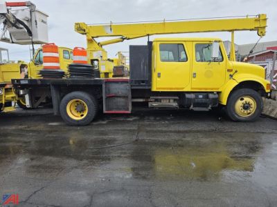 1992 International 4700 flatbed truck with yellow crane on flatbed, side view, used condition.