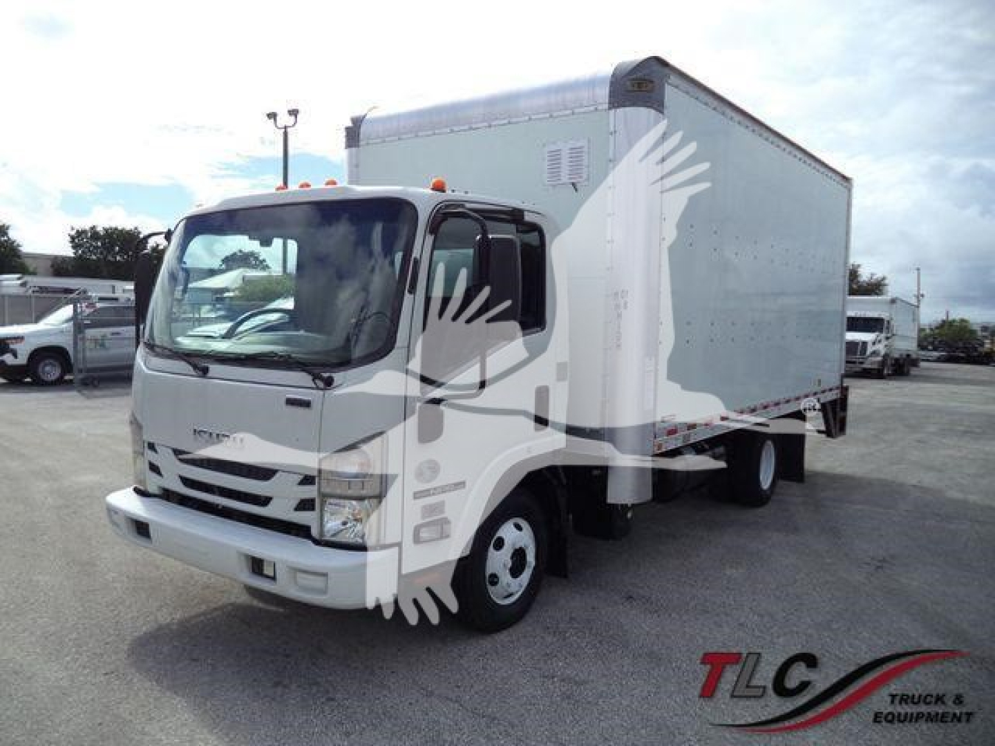 Box truck with gray cargo area and white cab from a 2021 Isuzu NPR HD, stock T06129FM, used condition.