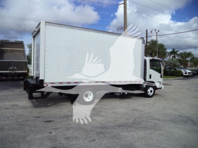 Isuzu NPR-HD box truck shown from rear-left side with cargo area, white cab, and medium-duty chassis.