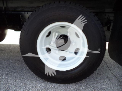 Isuzu NPR HD wheel and tire view; no readable labels or stickers visible.