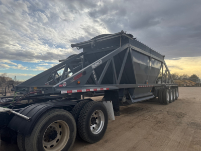 Ranco LW24464 trailer in-service showing frame with 'RANCO' branding and dump trailer structure. Side label visible but no detailed specs legible.