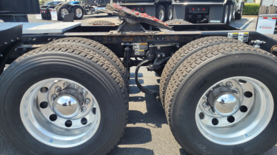 Two rear dual tires on the Peterbilt 579 chassis showing dual axles and wheel rims, with visible frame and components.