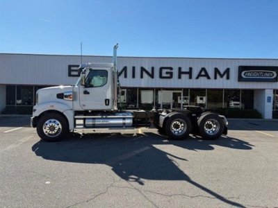 Western Star 49X day cab truck side view in front of dealership building
