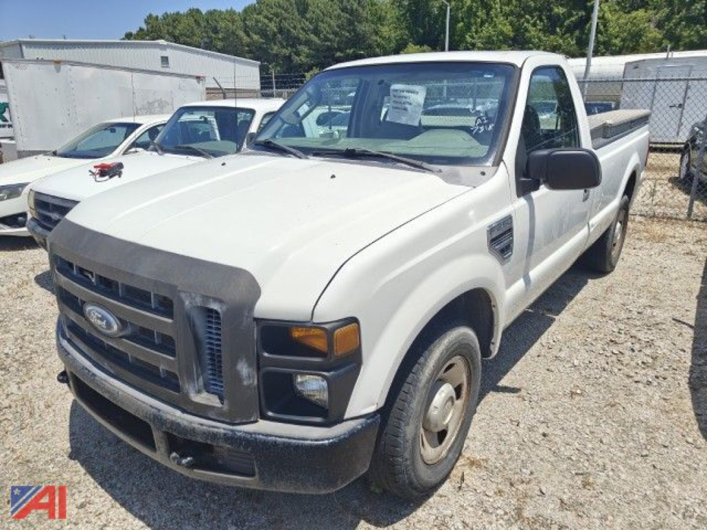 Ford F-250 Super Duty pickup truck in white, 2008 model year, 2WD with extended cab in a lot.