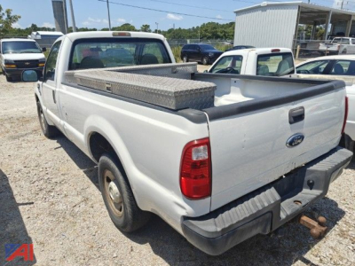 2008 Ford F-250 Super Duty pickup truck rear/side view showing service bed toolbox and tailgate.