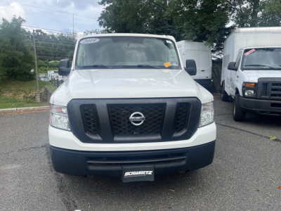 Nissan NV Cargo truck front view showing grille and bumper
