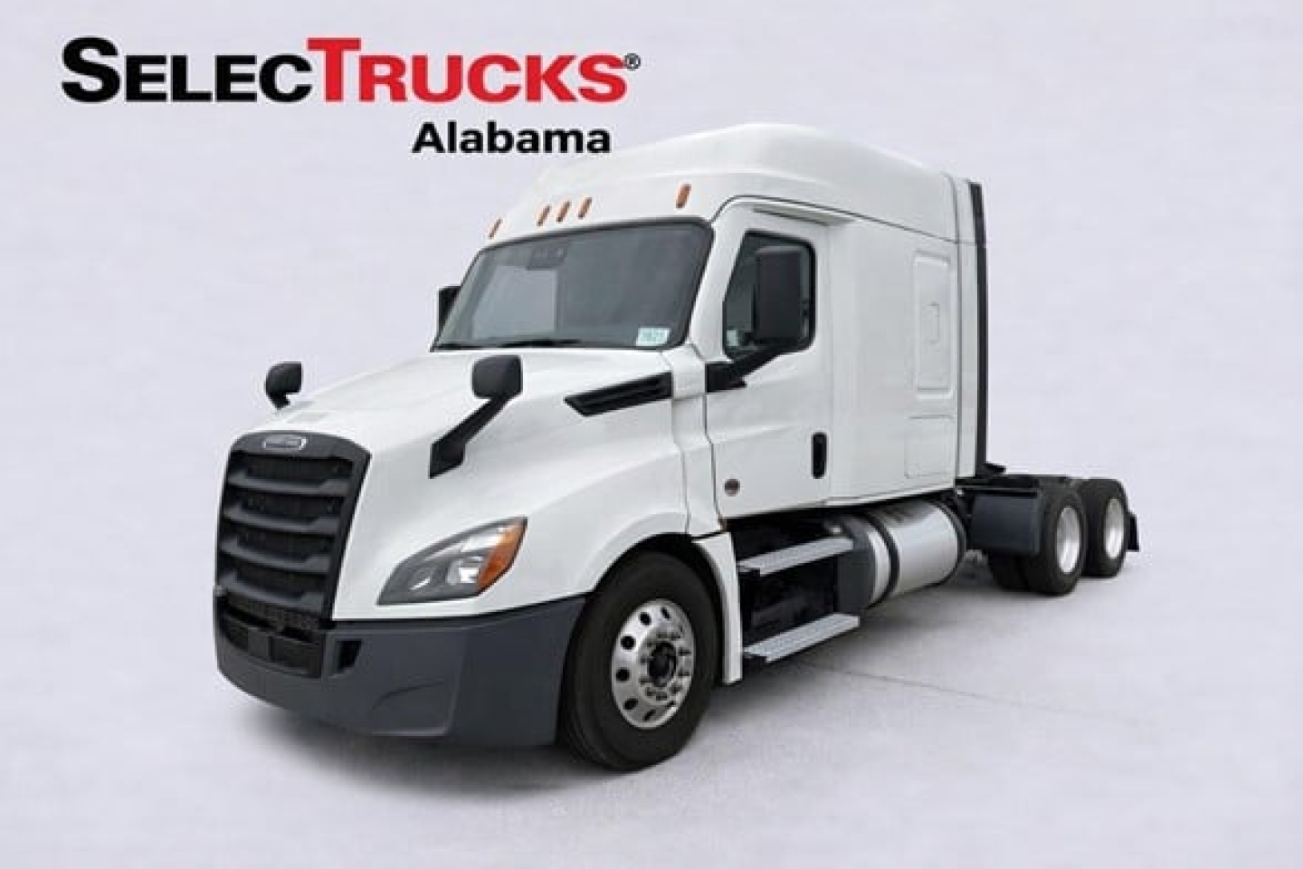 Freightliner Cascadia 126 tractor with white cab, side mirrors, and sleeper compartment, front view showing wheels and fuel tanks.