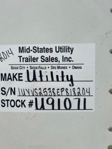 Label on a utility trailer showing Make Utility, S/N 1UYVS2538EP818204, STOCK # U91071, Mid-America Utility Trailer Sales, Inc.