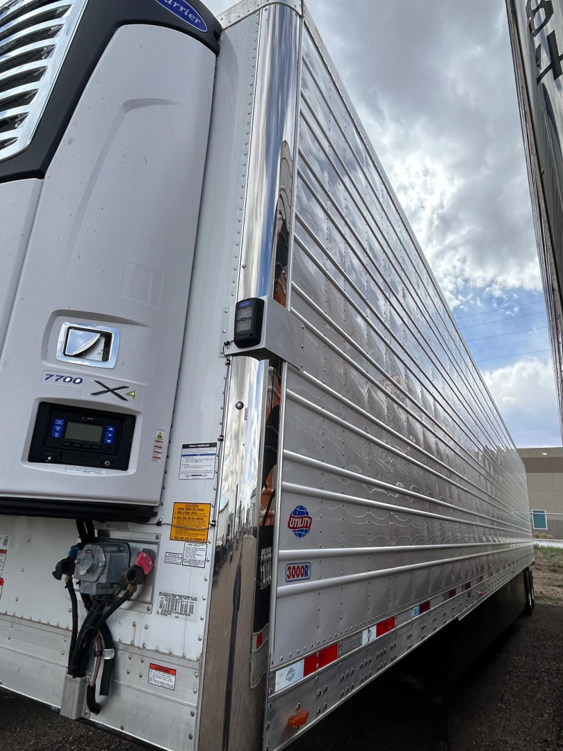Utility 3000R trailer side and front refrigeration unit showing Y600 X3000 branding and exterior aluminum panels.