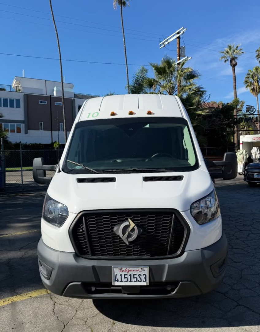 Ford Transit 350 HD cargo van front view showing grille emblem and California license plate 41515S3.