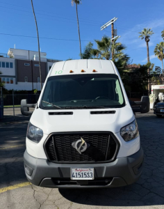 Ford Transit 350 HD cargo van front view showing grille emblem and California license plate 41515S3.