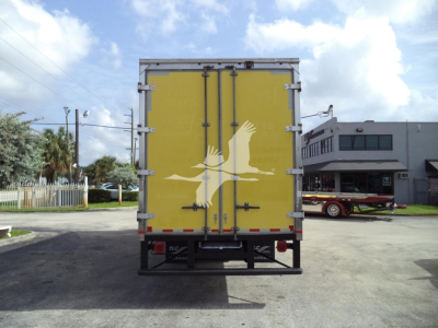 Rear view of 2020 International MV moving van with yellow doors and white bird logo, stock number T94955.