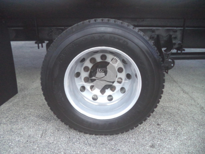 Wheel and tire on truck rim showing Goodyear tire and steel wheel with hub