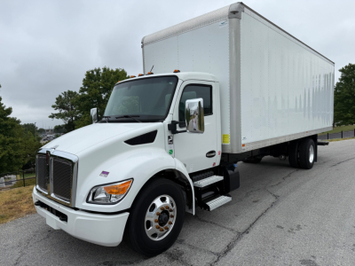 Kenworth T380 box truck in white, front three-quarter view showing cab and large box cargo area.
