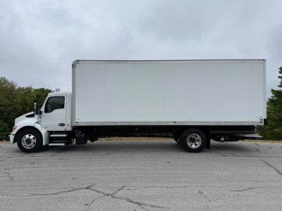 Kenworth T380 box truck side view showing cargo box and cab with wheels.