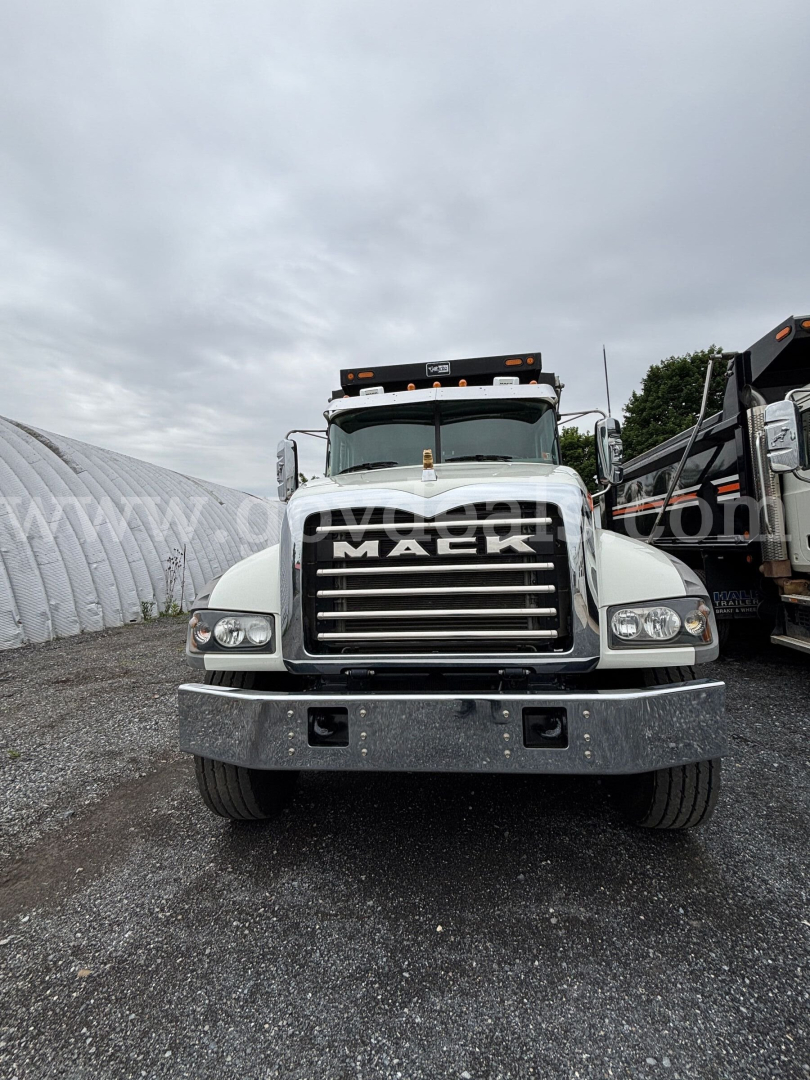 Mack Granite front view dump truck showing grille and bumper.