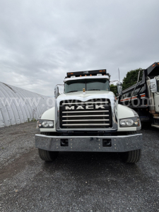 Mack Granite front view dump truck showing grille and bumper.