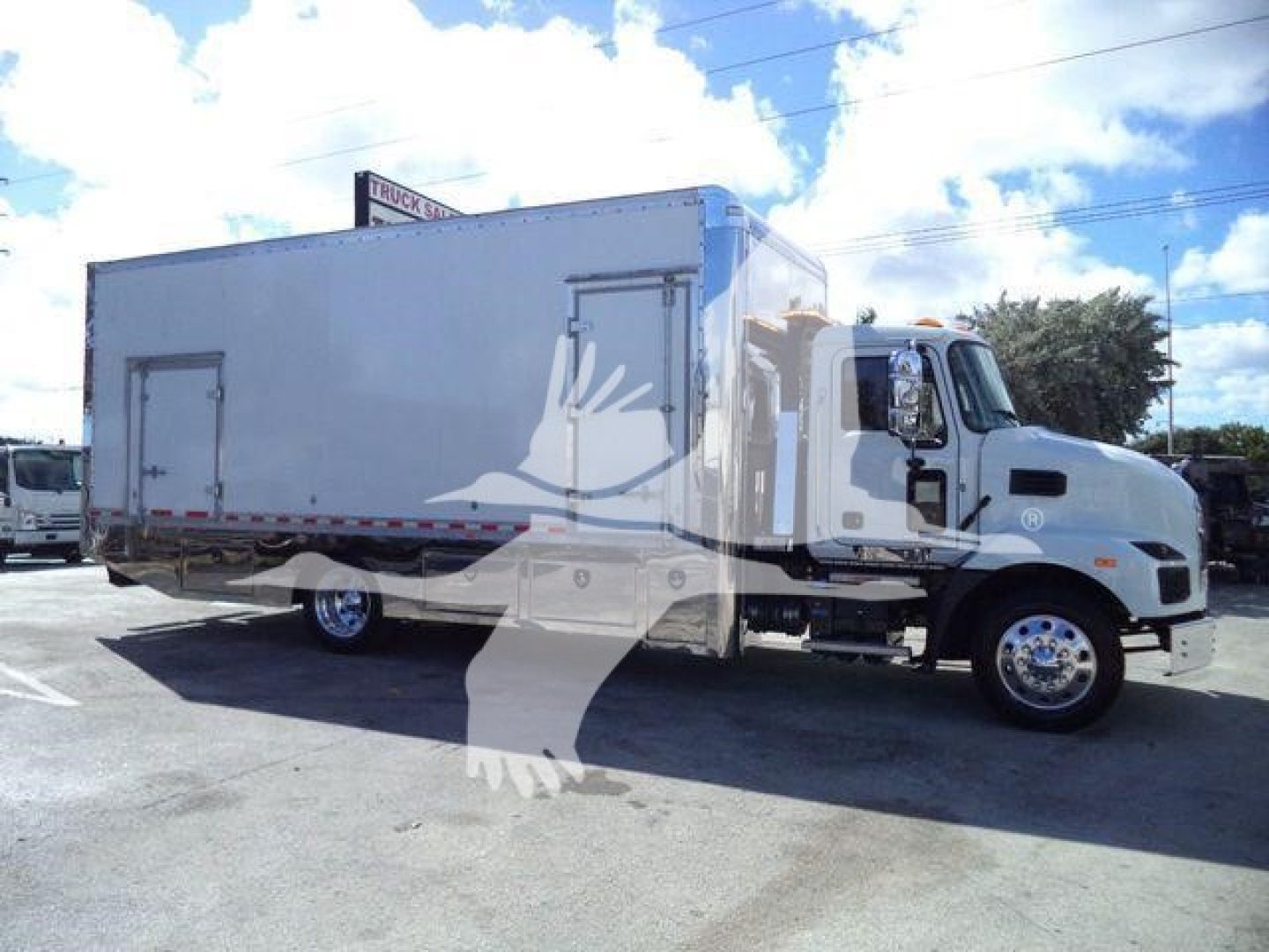 Road-legal box truck from the side, white cab and large rectangular box, with two side access doors and chrome wheels.