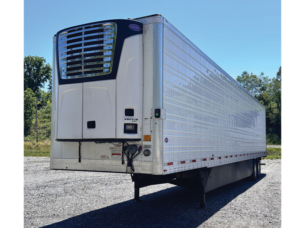 Trailer rear/front view of a 2025 Utility 3000R refrigerated trailer with a large front cooling unit and corrugated side panels.