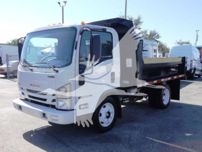 Isuzu NPR HD dump truck in white with dump bed, front view, side pallet.