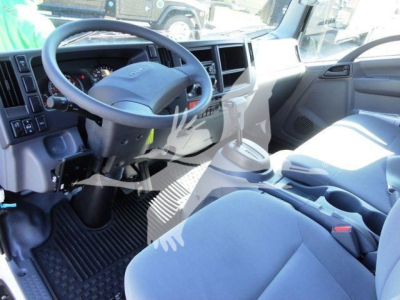 Isuzu NPR-HD truck interior showing steering wheel, driver's seat, and dashboard in view.