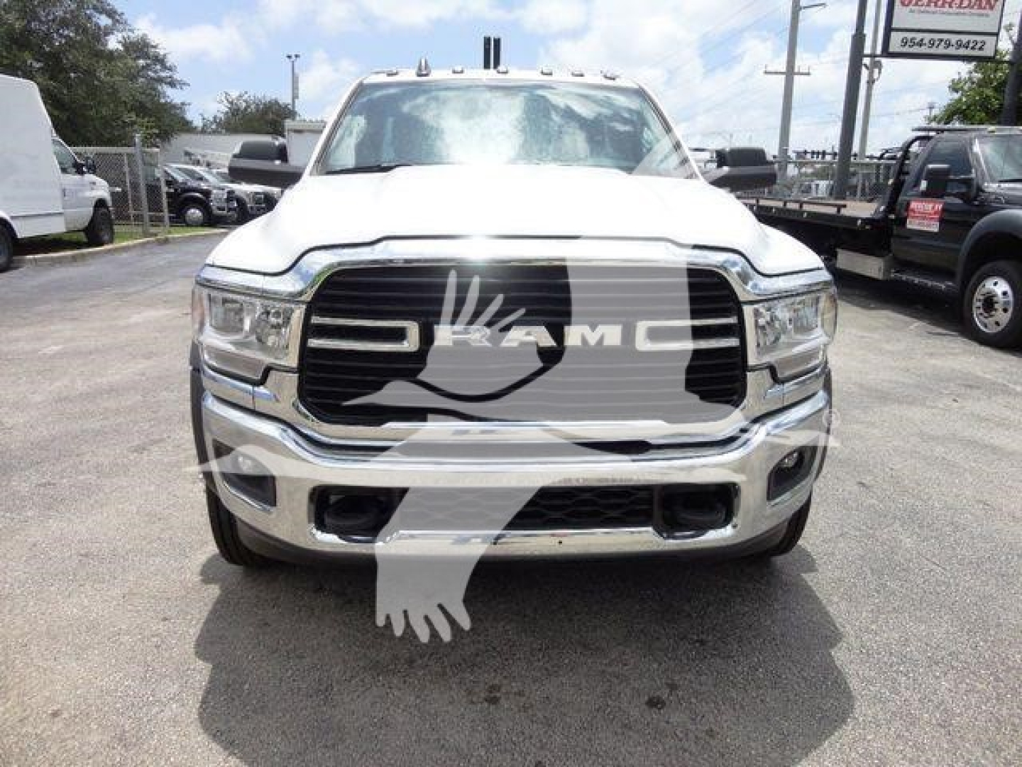 Front view of a 2024 Ram 4500 SLT truck with large grille and RAM emblem visible.