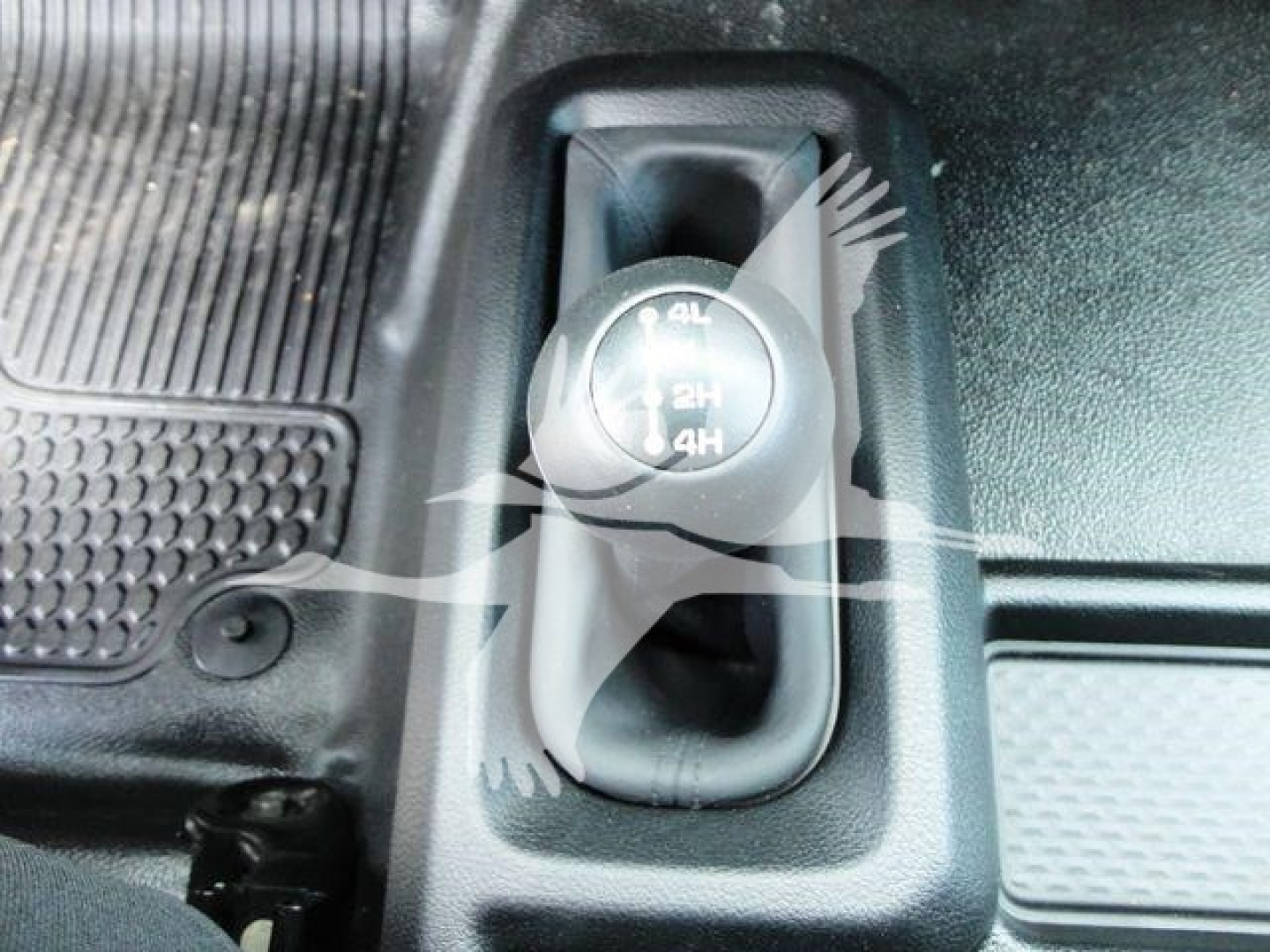 Dashboard gear dial showing 4x4 switch with positions 2H, 4H, 4L on a Ram 4500 controls.