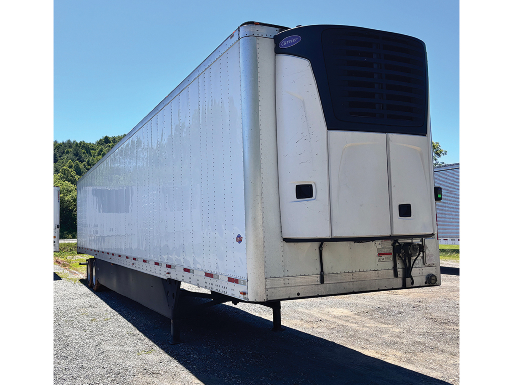 Utility 3000R trailer with refrigeration unit at front, white exterior, loading area view, VIN tag not visible.