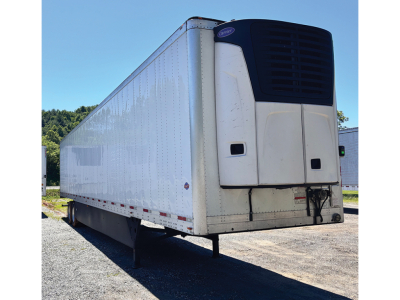 Utility 3000R trailer with refrigeration unit at front, white exterior, loading area view, VIN tag not visible.