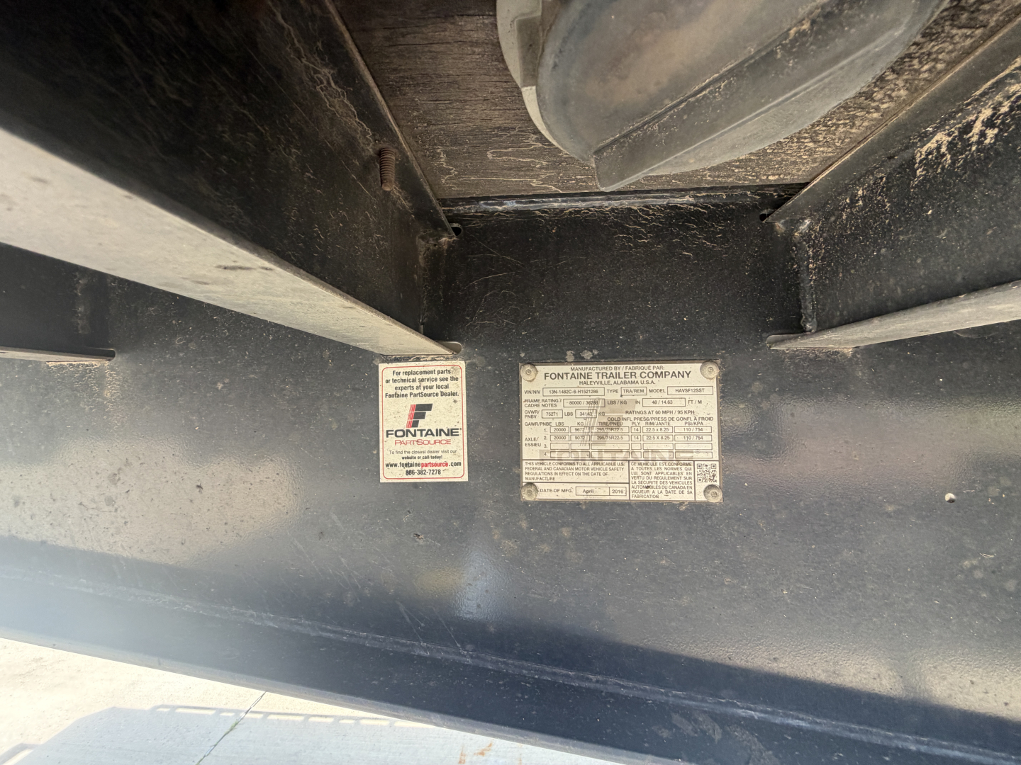 Fontaine HAVSF12SST trailer identification plates and labels on frame rail.