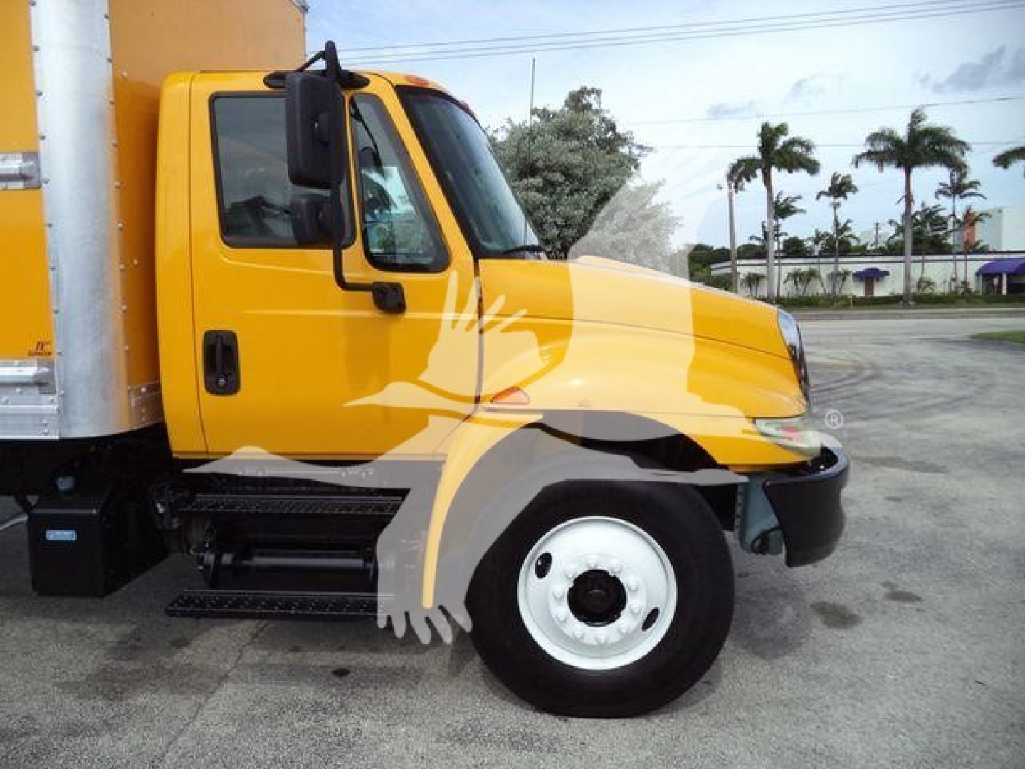 2018 International Durastar 4300 box truck side profile showing cab and front wheel.