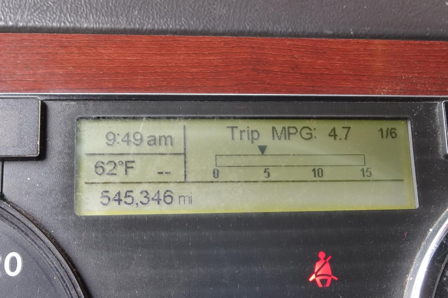 Vehicle instrument cluster display showing Trip MPG: 4.7, time 9:49 am, outside temperature 62°F, odometer 545,346 miles