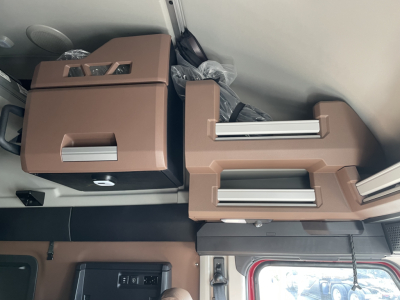 Mack PR64T76H truck cab interior components showing brown cabinets and overhead storage