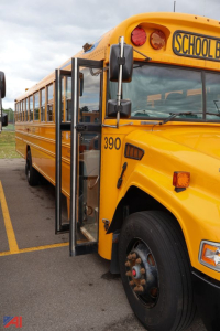School bus front left showing door open and exterior details