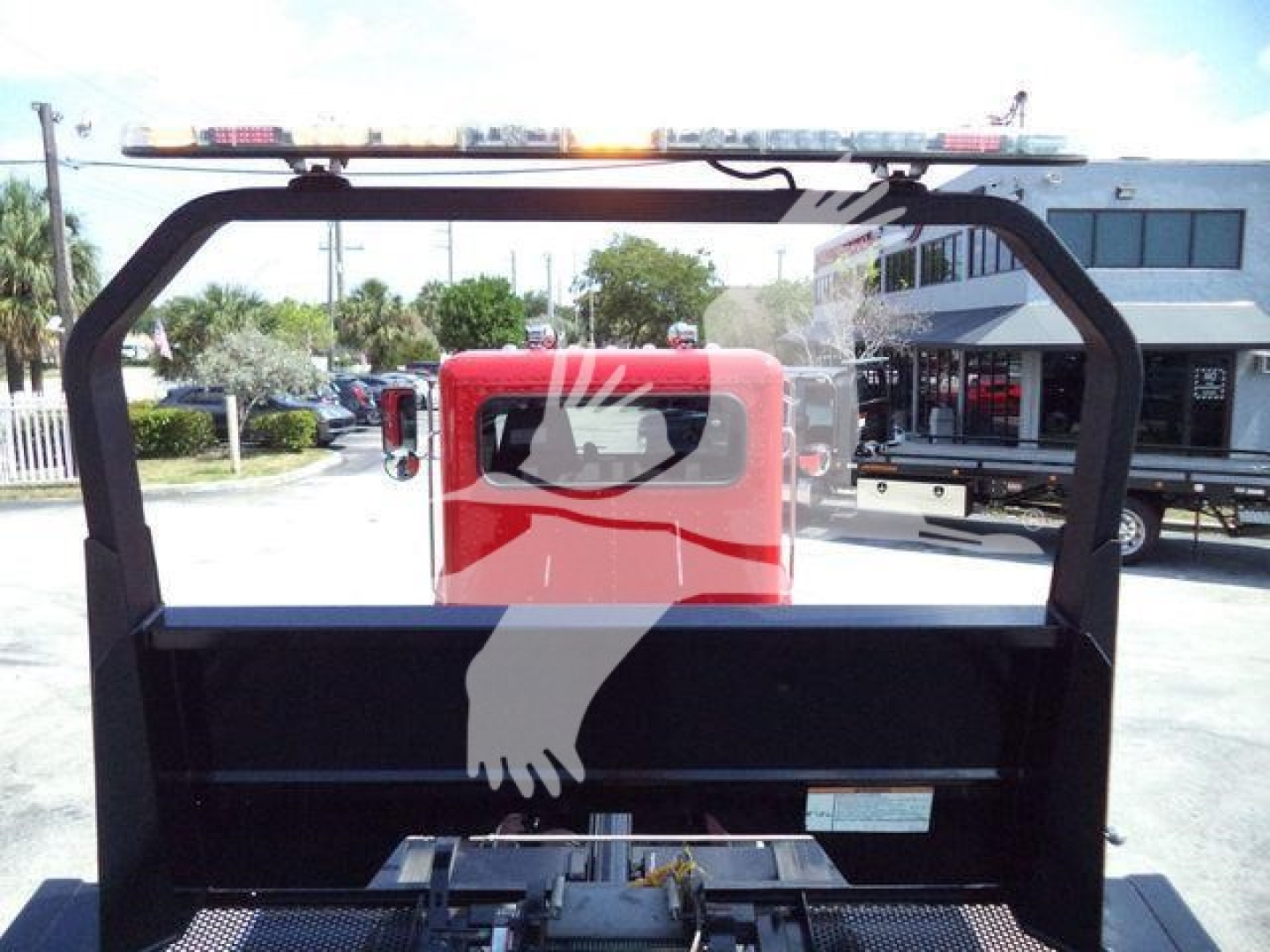 Peterbilt 337 rollback truck rear view with cab and equipment rack, stock number T21864
