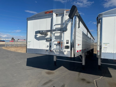 Timpte hopper trailer rear view showing 66-inch sides and rear toolbox with branding