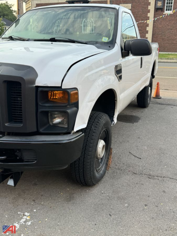 Truck front-left view of a white 2008 Ford F-250 Super Duty pickup with black bumper and grille, single cab, 4x4, wheel and tire visible