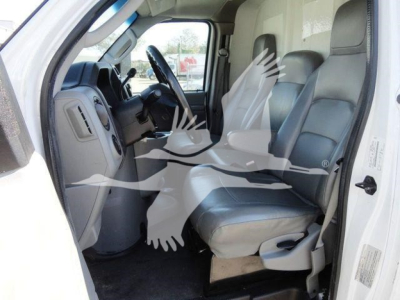 Ford E-450 cab interior showing front seats and steering wheel