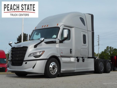 Freightliner Cascadia 126 truck featuring a white cab, black grille, aerodynamic mirrors, and Peach State Truck Centers logo in the top left.