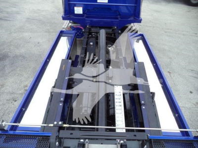Kenworth T280 rollback truck chassis visible from top with hydraulic components and rails; no legible model text in image