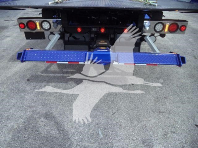 Kenworth T280 rollback rear with blue wheel lift and taillights.