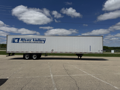 Trailer side view showing River Valley Trailers Leasing logo on a white 53' trailer with dual rear axles and landing gear.