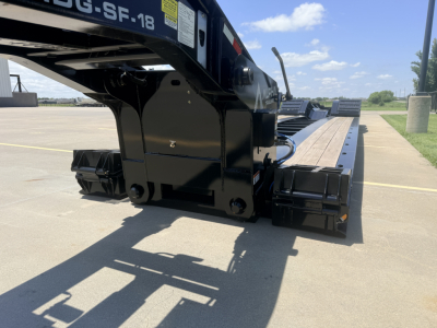 Trailer undercarriage with LDH 18" deck, black steel components, label 'SF-18' and structural cross-members visible.