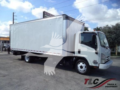 Isuzu NPR box truck in-service showing long rectangular cargo box with cab and side door, no visible branding text.