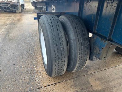 Great Dane Freedom LT trailer wheelset showing dual tandem tires and blue trailer frame.