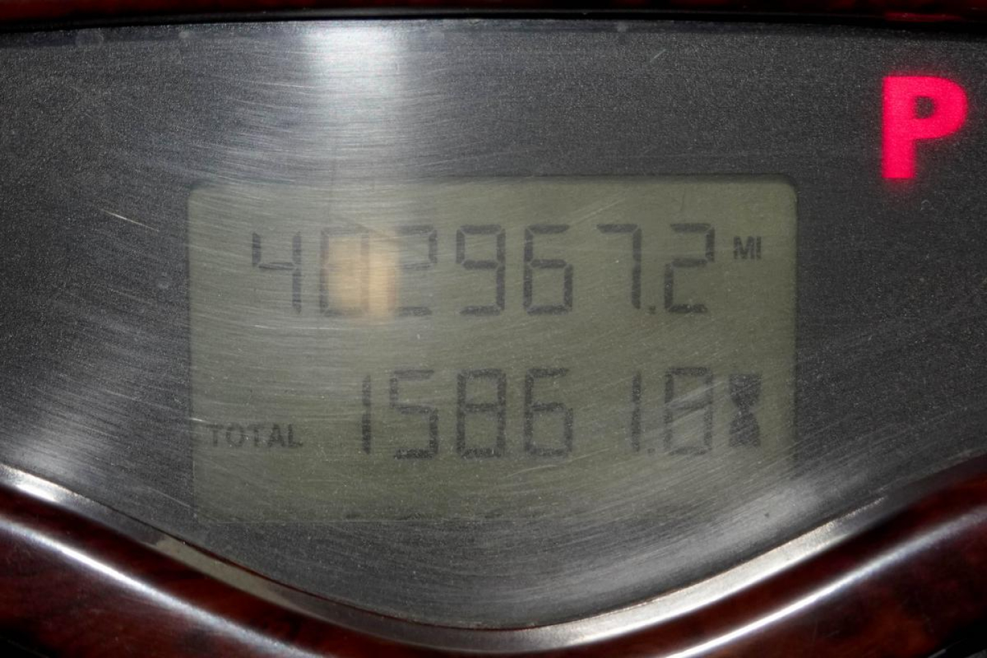 Mack CXN613 instrument cluster displaying odometer and total miles with digits 401,967.2 and 15,861.18 visible.