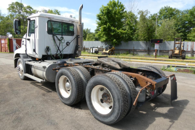 Truck chassis view showing rear axles and fifth wheel on a 2007 Mack CXN613 daycab
