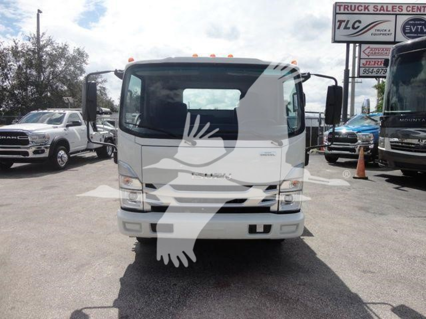 Isuzu NPR/NRR rollback truck front view with windshield, headlights, and side mirrors visible