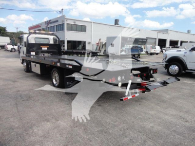 Isuzu NPR/NRR rollback truck flatbed rear view showing loading ramps and towing equipment.