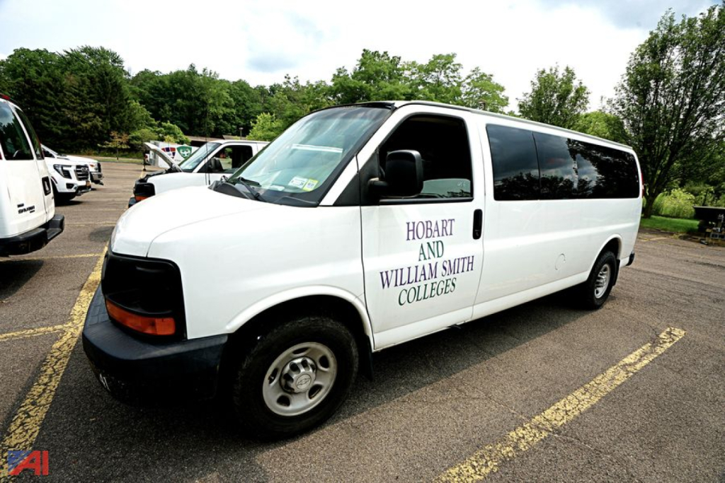 Chevrolet Express extended passenger van showing Hobart and William Smith Colleges text on side door.